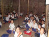 Students in an elementary school classroom in the camps